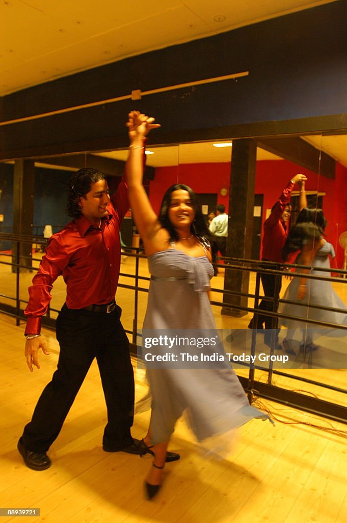 Kokila teaching her Students Rakhi Kapoor and Vijay Kapoor at the Academy of Modern Dance in Chennai, Tamil Nadu, India ( guided by Kokila, Dance, Rakhi Kapoor and Vijay Kapoor teaching by Kokila at the Academy of Modern Dance )
