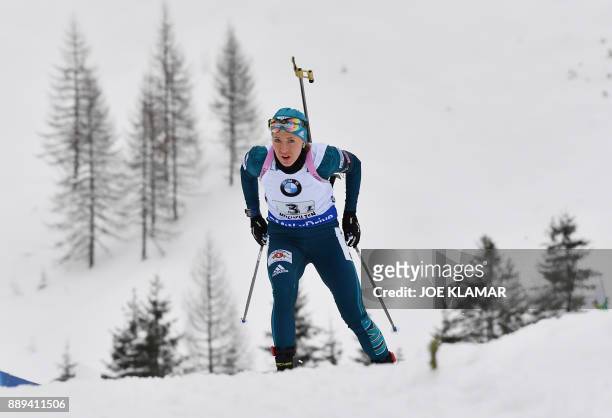 Yuliia Dzhima of Ukraine competes during the women's 4x6 km relay event at the IBU World Cup Biathlon in Hochfilzen, Austria on December 10, 2017. /...