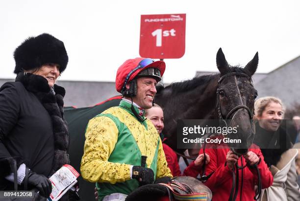 Ireland - 10 December 2017; Trainer Jessica Harrington with jockey Robbie Power and horse Sizing John in the winner's enclosure after winning the...
