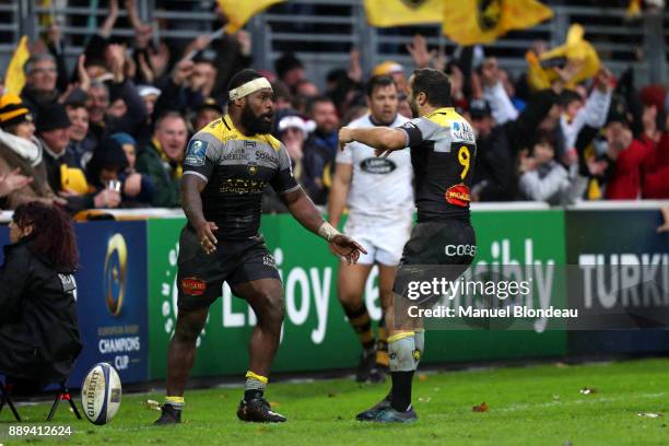 Levani Botia of La Rochelle celebrates with Alexi Bales after scoring a try during the European Champions Cup match between La Rochelle and London...