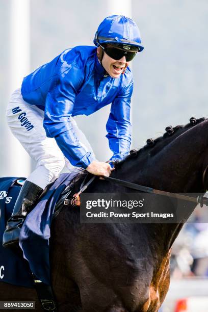 Jockey Mickael Barzalona riding Talismanic competes in the Longines Hong Kong Vase during the Longines Hong Kong International Races at Sha Tin...