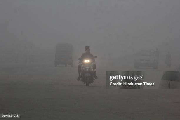 Visibility is low due dense smog in morning hours at Thane, on December 9, 2017 in Mumbai, India. A dense haze descended over Mumbai affecting...