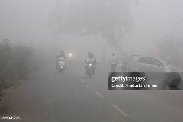 Visibility is low due dense smog in morning hours at Thane, on December 9, 2017 in Mumbai, India. A dense haze descended over Mumbai affecting...