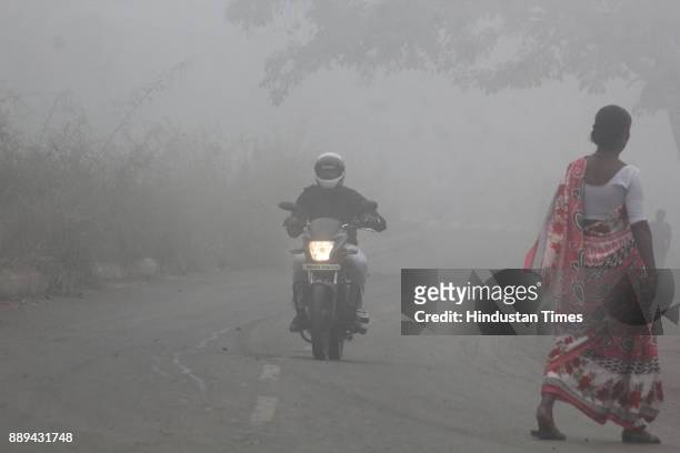 Visibility is low due dense smog in morning hours at Thane, on December 9, 2017 in Mumbai, India. A dense haze descended over Mumbai affecting...