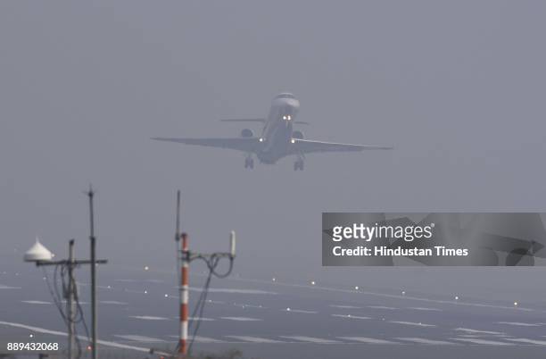 Visibility is low due to dense Smog at Mumbai airport, Vile Parle, on December 9, 2017 in Mumbai, India. A dense haze descended over Mumbai affecting...
