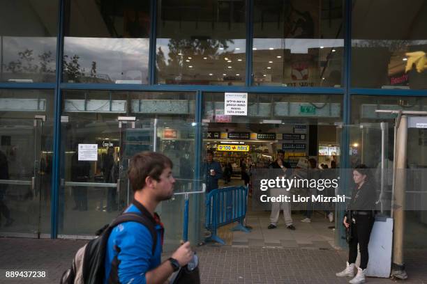 Israeli security guard is seen at the scene of an attack at the Jerusalem Central Bus Station on December 10, 2017 in Jerusalem, Israel. An Israeli...
