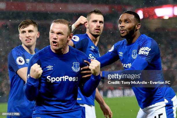 Wayne Rooney of Everton celebrates his goal during the Premier League match between Liverpool and Everton at Anfield on December 10, 2017 in...