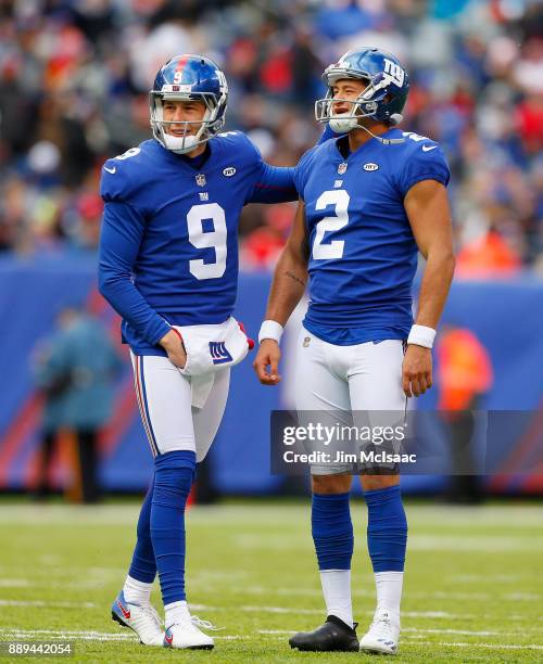 Brad Wing and Aldrick Rosas of the New York Giants in action against the Kansas City Chiefs on November 19, 2017 at MetLife Stadium in East...