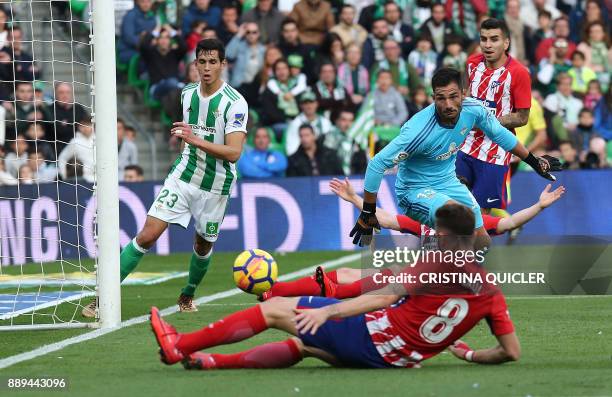 Atletico Madrid's Spanish midfielder Saul Niguez scores a goal during the Spanish league football match between Real Betis and Atletico Madrid at the...