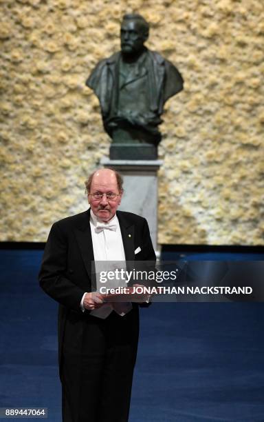 Nobel Prize in Physiology or Medicine 2017 laureate, US geneticist and chronobiologist Jeffrey Connor Hall, acknowledges applause after being awarded...