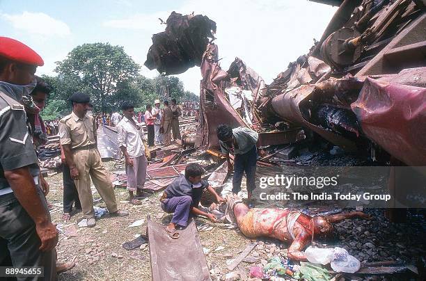 Injured people are taken out of bogies afterTrain Accident at Gaisal Railway Station in West Bengal