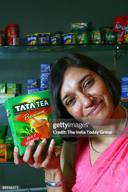 Sangeeta Talwar, Executive Director, Tata Tea, poses with Tata Tea pouch at office in Bangalore, india. Potrait