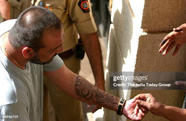 Indian Bollywood actor Sanjay Dutt comes out from the Yerwada Jail in Pune, 23 August 2007. Hundreds of fans gathered outside the high-security...