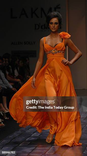 Model is walking on the ramp with Fashion designers Falguni and Shane outfit at Lakme Fashion Week Spring Summer-2007 in Mumbai, Maharashtra, India