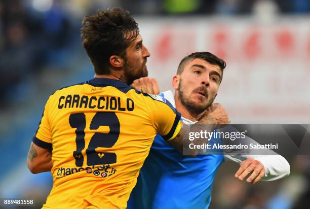 Antonio Caracciolo of Hellas Verona competes for the ball whit Alberto Paloschi of Spal during the Serie A match between Spal and Hellas Verona FC at...