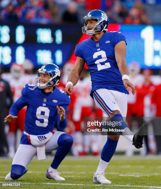 Aldrick Rosas and Brad Wing of the New York Giants in action against the Kansas City Chiefs on November 19, 2017 at MetLife Stadium in East...