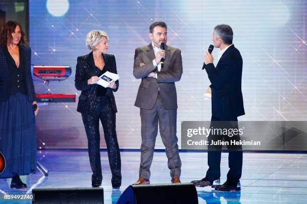 Zazie, Sophie Davant, Clovis Cornillac and Nagui perform on stage during the 31st France Television Telethon at Pavillon Baltard on December 9, 2017...