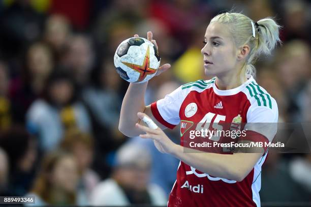 Noemi Hafra of Hungary throws a ball during IHF Women's Handball World Championship round of 16 match between Hungary and France on December 10, 2017...