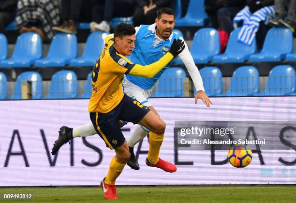 Alex Ferrari of Hellas Verona competes for the ball whit Marco Boriello of Spal during the Serie A match between Spal and Hellas Verona FC at Stadio...