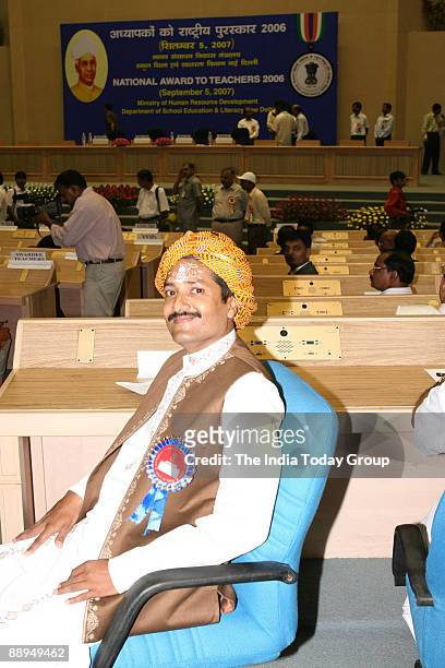 Indian primary school teacher from the Madhya Pradesh state Rakesh Bhargava waits for his turn to receive a National Teachers Award for the year 2006...