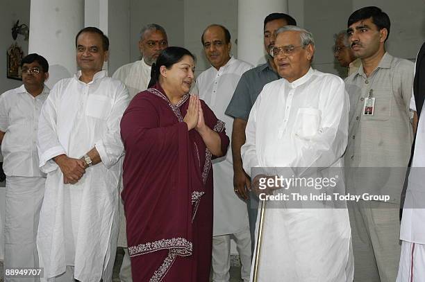 Jayalalitha, former Chief Minister of Tamil Nadu and President of All India Anna Dravida Munetra Khazagam along with Atal Bihari Vajpayee, former...