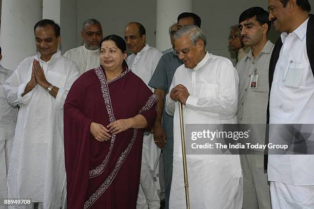 Jayalalitha, former Chief Minister of Tamil Nadu and President of All India Anna Dravida Munetra Khazagam along with Atal Bihari Vajpayee, former...