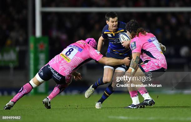 Exeter , United Kingdom - 10 December 2017; Jonathan Sexton of Leinster in action against Thomas Waldrom, left, and Harry Williams of Exeter Chiefs...