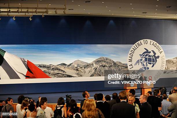 Australian Prime Minister Kevin Rudd and US President Barack Obama speak at the Group of Eight summit in L'Aquila, central Italy, on July 9, 2009. An...