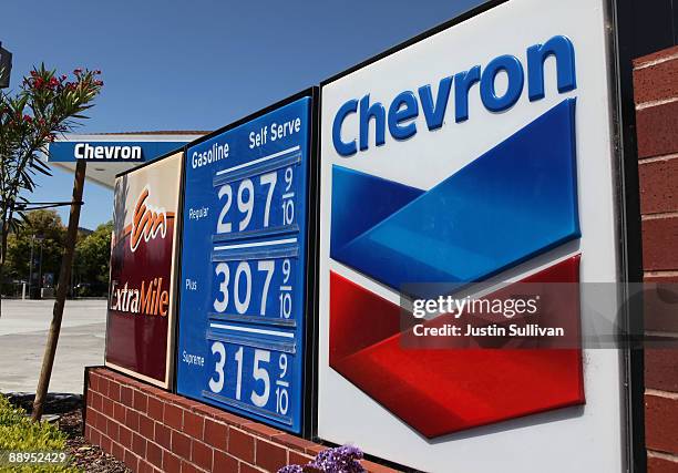 Gasoline prices are displayed at a Chevron service station July 9, 2009 in Greenbrae, California. Chevron will report quarterly earnings after the...