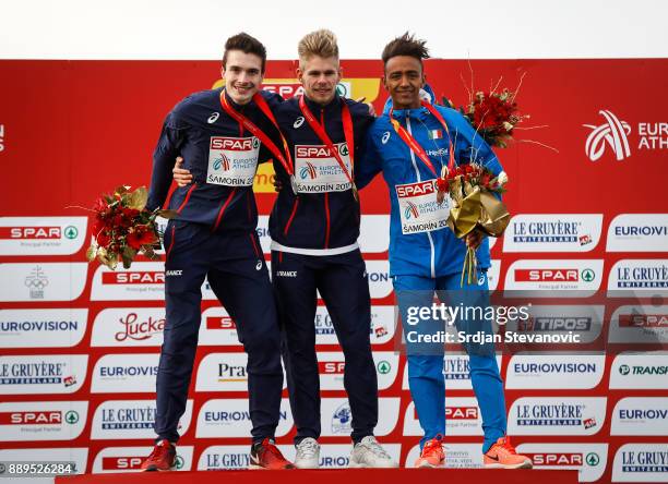 Silver Medalist Hugo Hay of France, Gold Medalist Jimmy Gressier of France and Bronze Medalist Yemaneberhan Crippa of Italy pose during the U23 Men's...