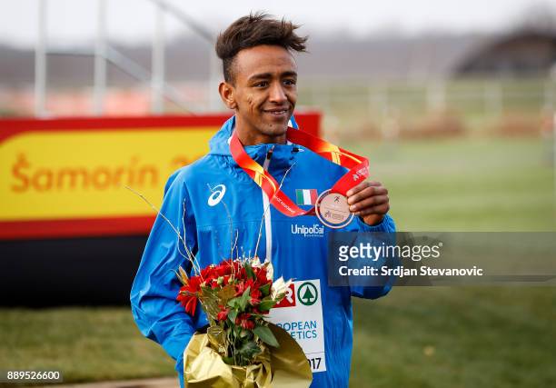 Yemaneberhan Crippa of Italy celebrates his Bronze Medal during the U23 Men's award ceremony during the SPAR European Cross Country Championships on...