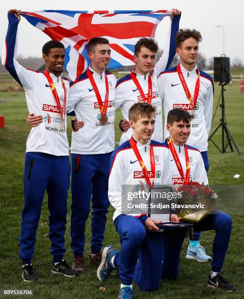 Great Britain celebrate their Bronze Medal during the U23 Men's award ceremony during the SPAR European Cross Country Championships on December 10,...