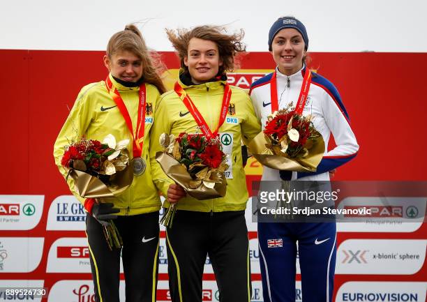 SIlver Medallist Konstanze Klosterhalfen of Germany, Gold Medalist Alina Reh of Germany and Bronze Medalist Jessica Judd of Great Britain pose during...