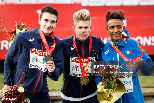 Silver Medalist Hugo Hay of France, Gold Medalist Jimmy Gressier of France and Bronze Medalist Yemaneberhan Crippa of Italy pose during the U23 Men's...