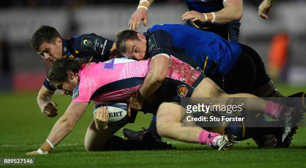 Leinster forward Rhys Ruddock puts in a big tackle on Chiefs prop Alec Hepburn during the European Rugby Champions Cup match between Exeter Chiefs...