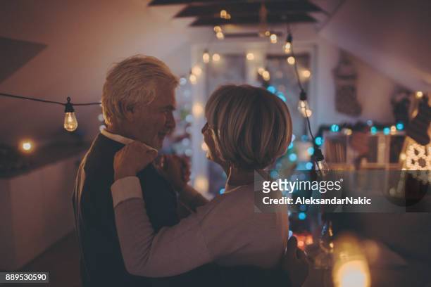 slow dance on new year's eve - men of the year party inside stock pictures, royalty-free photos & images