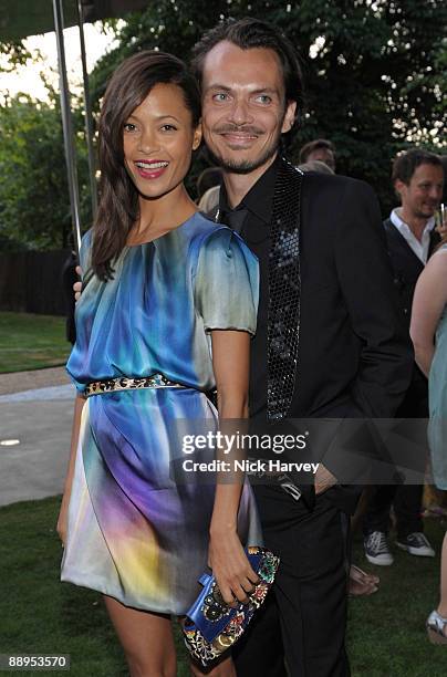 Actress Thandie Newton and fashion designer Matthew Williamson attend the annual Summer Party at the Serpentine Gallery on July 9, 2009 in London,...