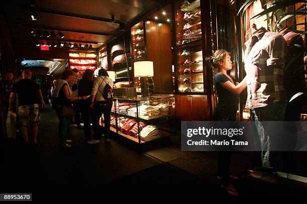 People shop in the Abercrombie & Fitch flagship store July 9, 2009 in New York City. Abercrombie & Fitch Co. Posted a 32 percent drop in same-sale...