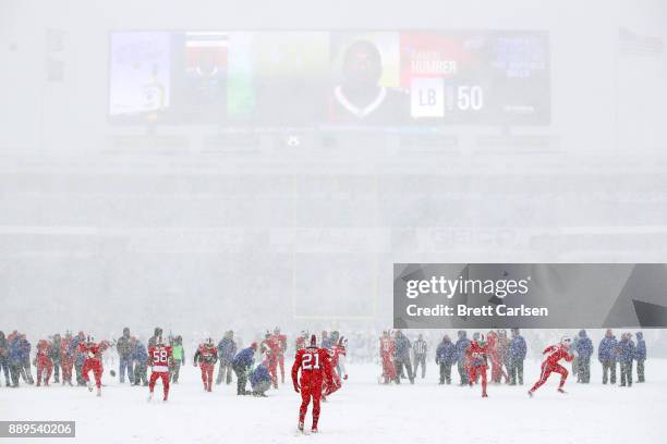 Buffalo Bills warm up in the snow before a game against the Indianapolis Colts on December 10, 2017 at New Era Field in Orchard Park, New York.