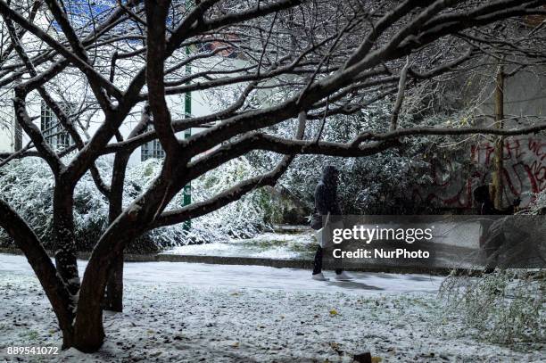 The city of Milan covered by an intense snowfall in the afternoon. Milan, December 10, 2017