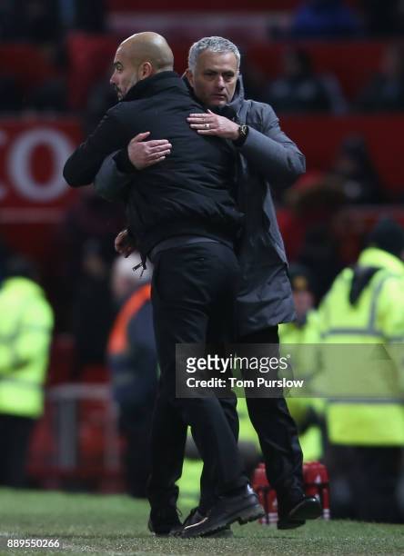 Manager Jose Mourinho and Manager Pep Guardiola of Manchester City shake hands after the Premier League match between Manchester United and...