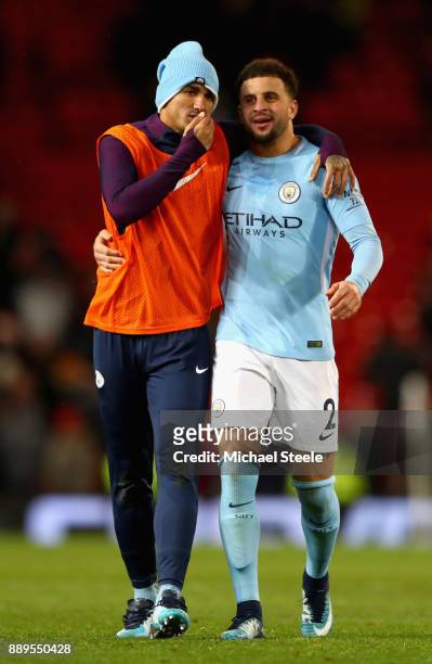 Kyle Walker and Danilo of Manchester City react after the Premier League match between Manchester United and Manchester City at Old Trafford on...