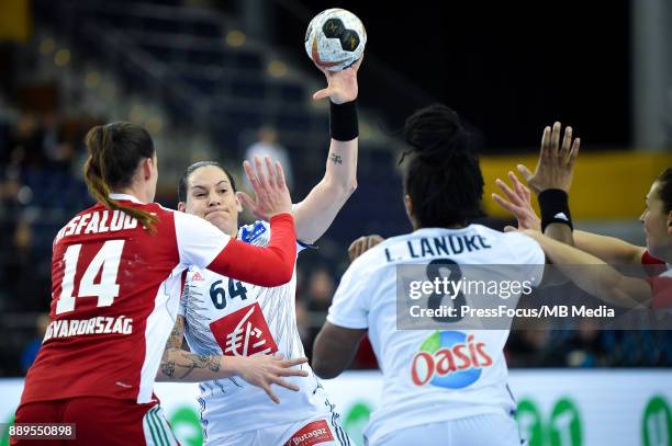 Alexandra Lacrabere of France passes the ball during IHF Women's Handball World Championship round of 16 match between Hungary and France on December...