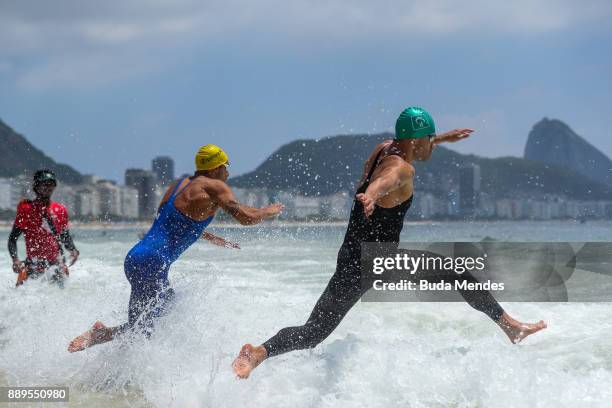 Fernando Ponte and Leonardo de Deus of Brazil in action on the course at Copacabana Beach during the Rei e Rainha do Mar 2017 on December 10, 2017 in...