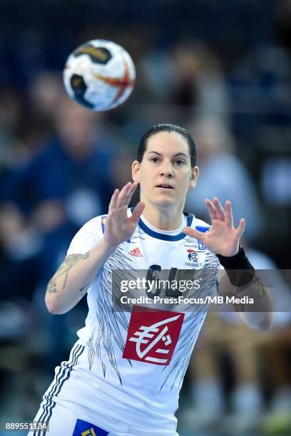 Alexandra Lacrabere of France catches the ball during IHF Women's Handball World Championship round of 16 match between Hungary and France on...