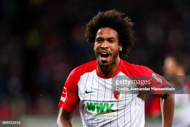 Caiuby of Augsburg celebrates after scoring his team's first goal to make it 1-0 during the Bundesliga match between FC Augsburg and Hertha BSC at...