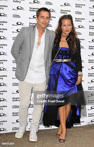 Dan Williams and Jade Jagger arrive at The Serpentine Gallery Summer Gallery on July 9, 2009 in London, England.