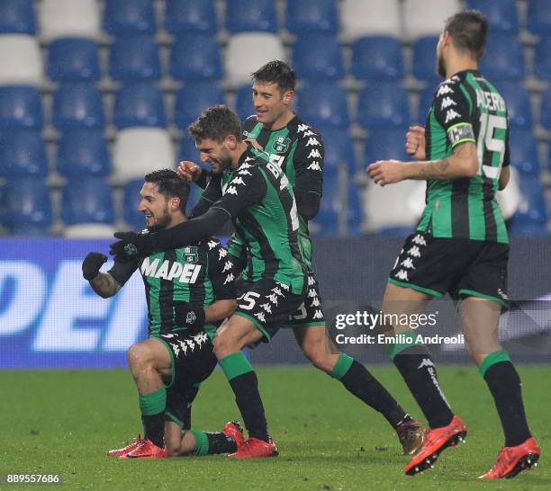 Matteo Politano of US Sassuolo Calcio celebrates his goal with his team-mate Domenico Berardi and Federico Peluso during the Serie A match between US...