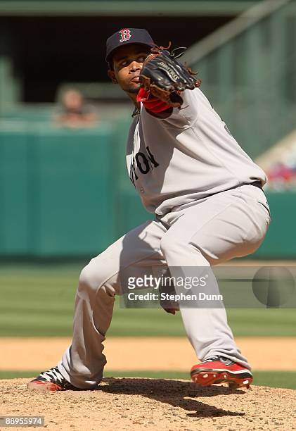 Pitcher Ramon Ramirez of the Boston Red Sox throws a pitch against the Los Angeles Angels of Anaheim on May 14, 2009 at Angel Stadium in Anaheim,...