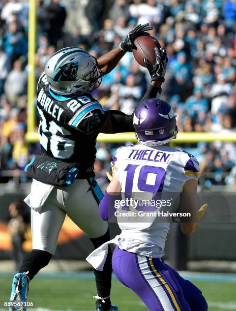 Daryl Worley of the Carolina Panthers intercepts the ball against Adam Thielen of the Minnesota Vikings in the first quarter during their game at...